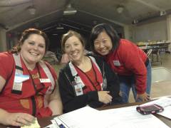 Volunteers Jennifer Milbourn, Megan Justine, and Jasmine Su at the Rim Fire Shelter.