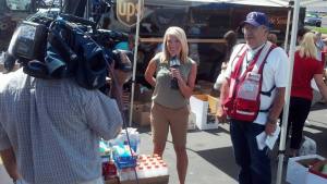 Vietnam Veteran and Red Cross volunteer Dennis Bartell helps out during June's 'Operation Care Package'