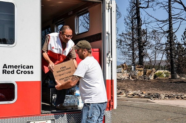 Volunteer Freddy Aw helps deliver relief supplies to residents of Weed, CA following September's Boles Fire.