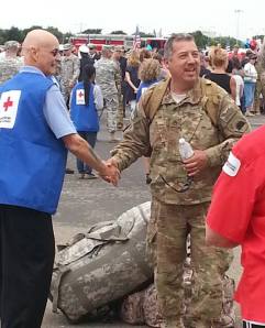Red Cross volunteers welcome troops home at the Stockton Airport.