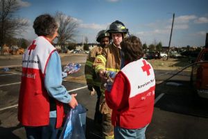 Emergency Response Vehicle drivers Vicki Oczkowicz and Brenda Clampitt hand out snacks to firefighters at Union University, Jackson, Tennessee.