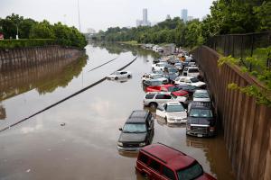 Motorists are stranded along I-45 along North Main in Houston after storms flooded the area, Tuesday, May 26, 2015. Overnight heavy rains caused flooding closing some portions of major highways in the Houston area. (Cody Duty/Houston Chronicle via AP)