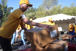 Dawn Dwyer of SBC helps load food and supplies for delivery to communities impacted by the Butte Fire.